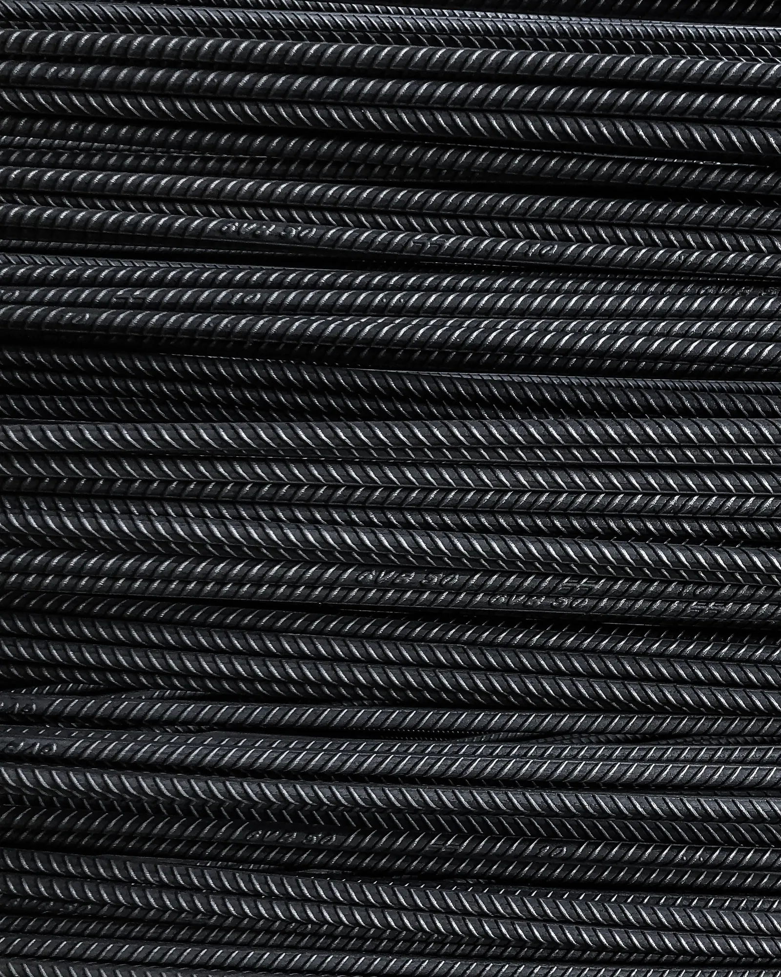 Close-up of ribbed TMT steel bars